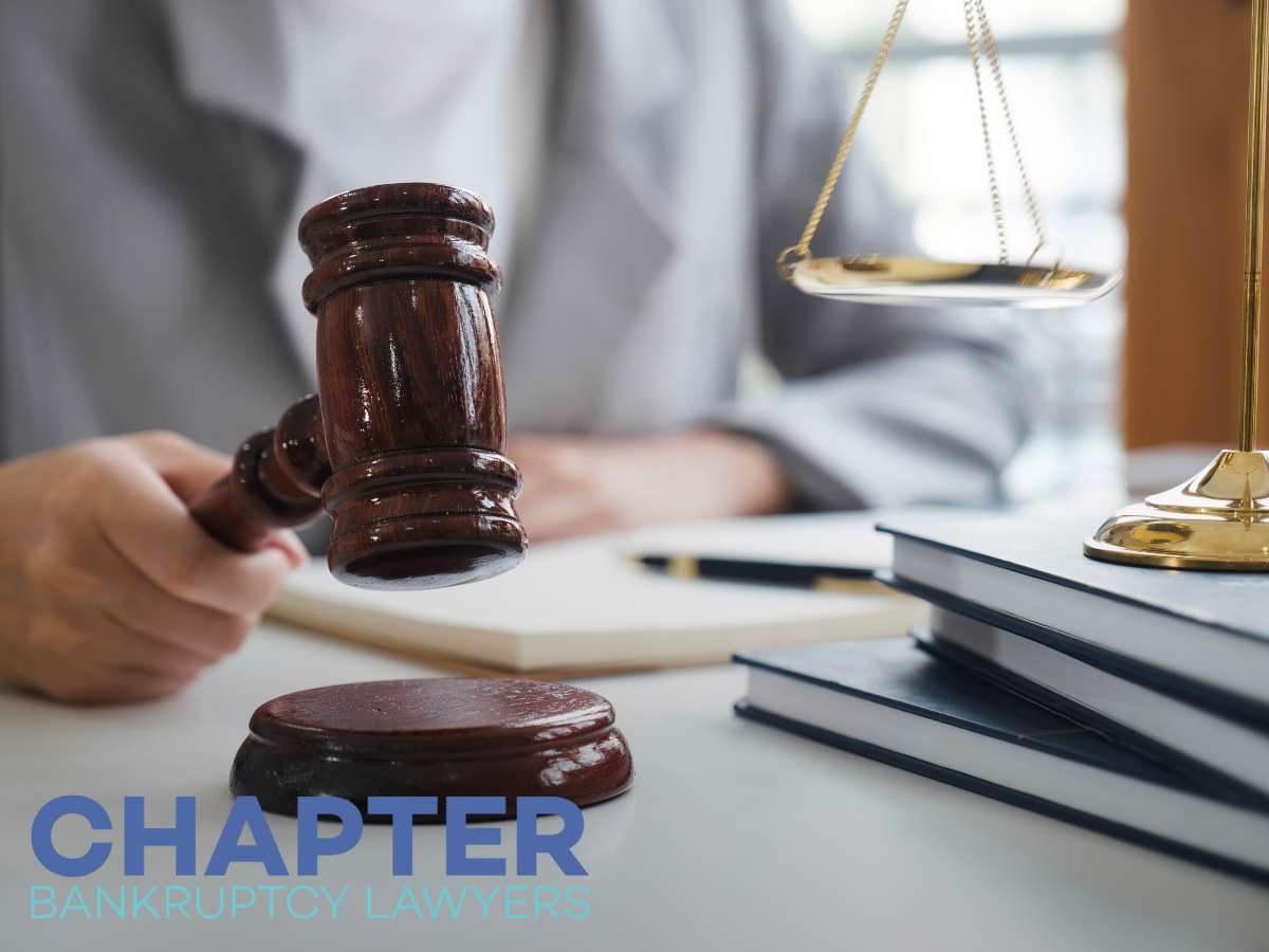 Chapter Bankruptcy Lawyers' gavel and scales of justice, symbolizing legal authority in bankruptcy proceedings.
