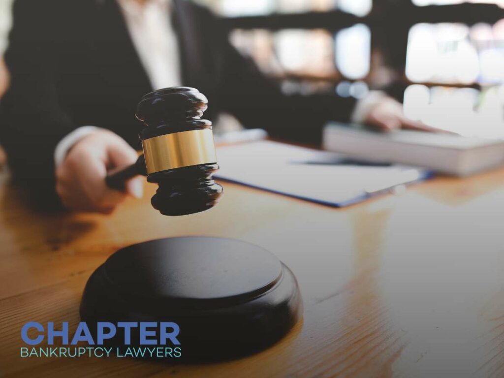 Judge with gavel at desk during legal proceedings related to medical debt resolution